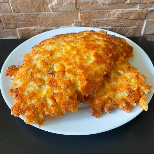 Шніцель курячий в сирній паніровці